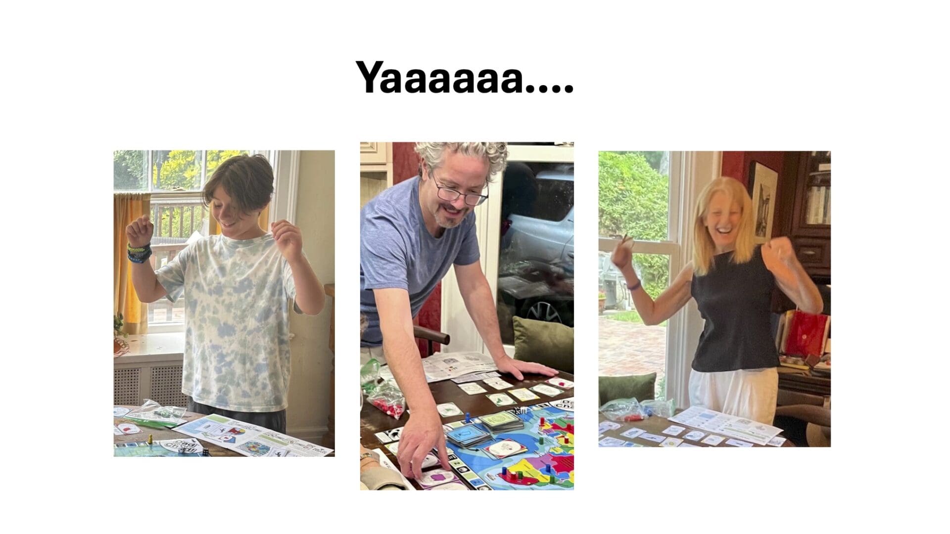 Three people celebrating around a table.